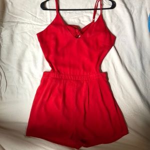 Red Romper. Backless & Side cut outs. Size 4/6.
